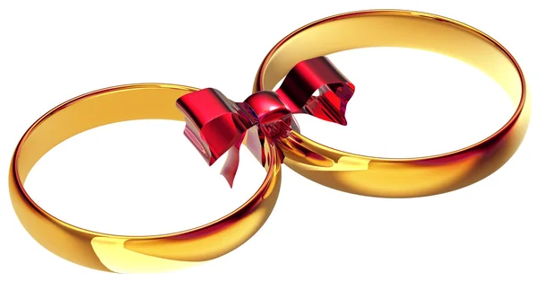 Gold wedding rings with the silk bow — Stock Photo, Image