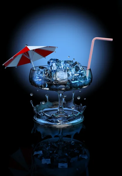 Cocktail with ice cubes, umbrella and straw — Stock Photo, Image