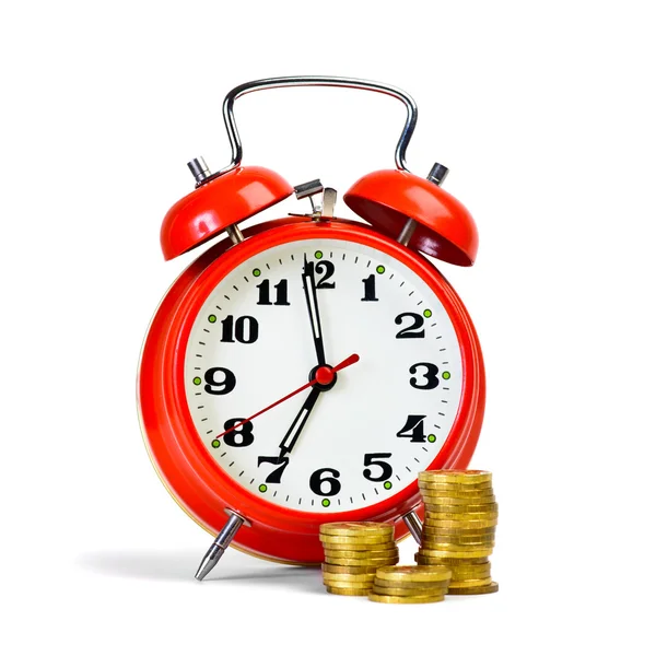 Alarm clock and yellow coins — Stock Photo, Image