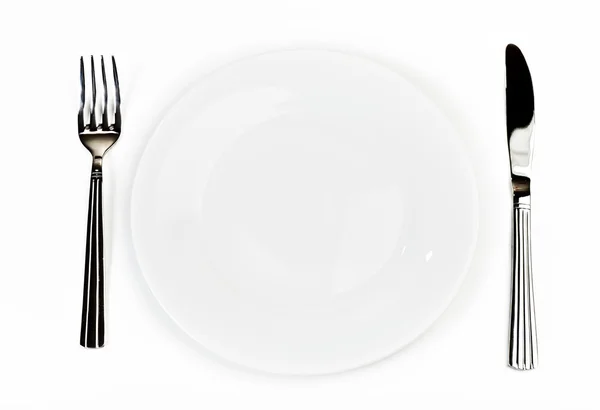 带刀叉的盘子 — 图库照片