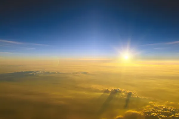 Sunset above the clouds — Stock Photo, Image