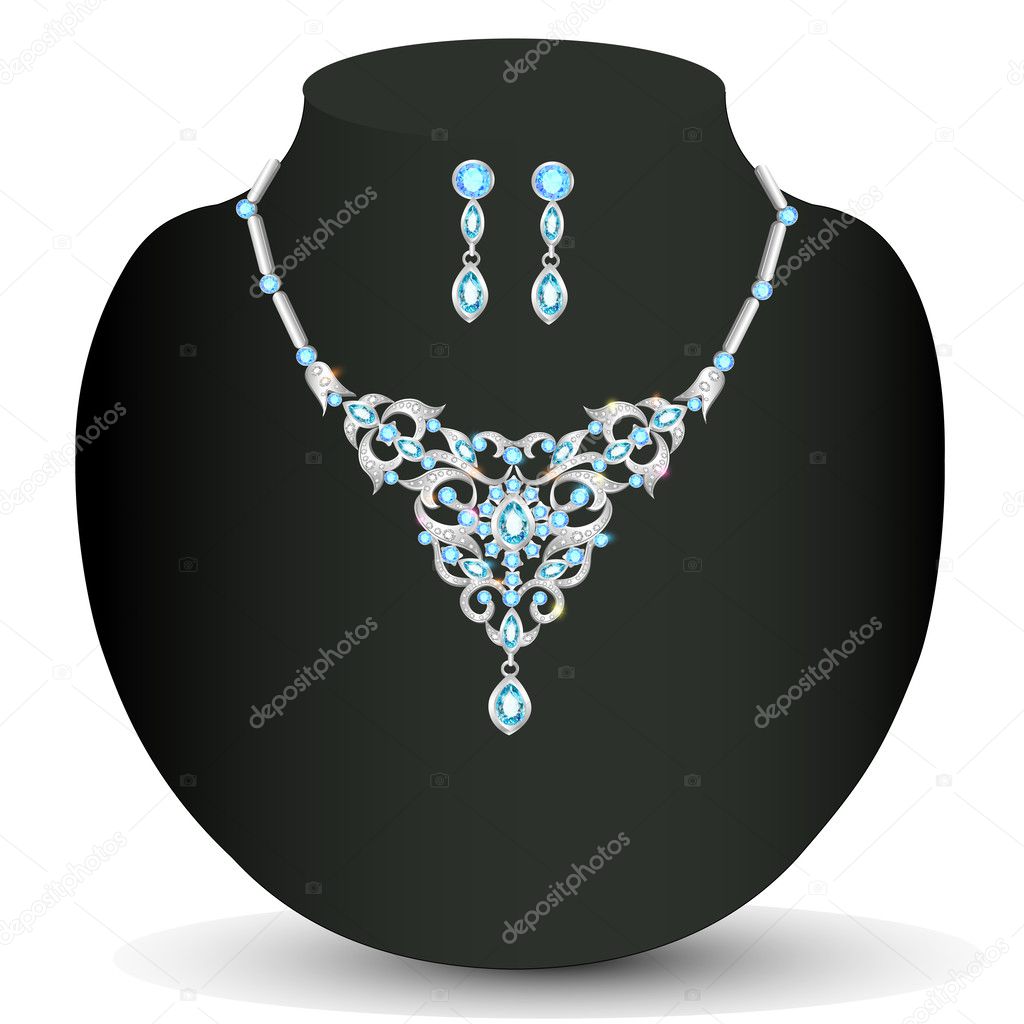 of a necklace and earrings with blue jewels