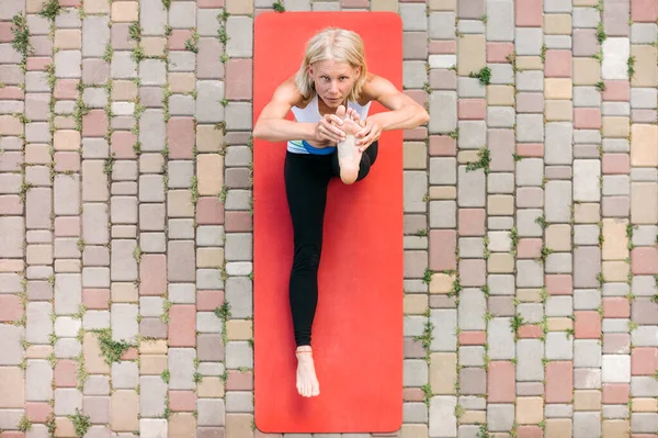 Woman Doing Yoga Top View Practice Body Exercises Health — Zdjęcie stockowe