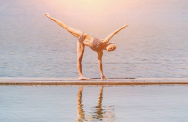 reflection training woman practice yoga at nature