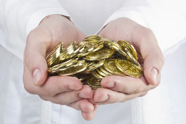 Coins in Hands — Stock Photo, Image
