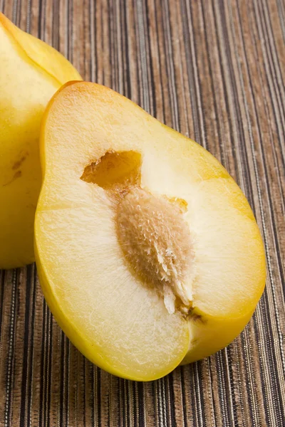 Half of yellow plums — Stock Photo, Image
