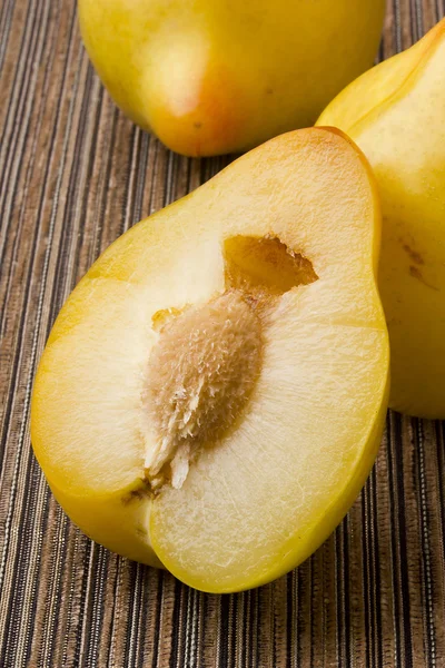 Half of yellow plums — Stock Photo, Image