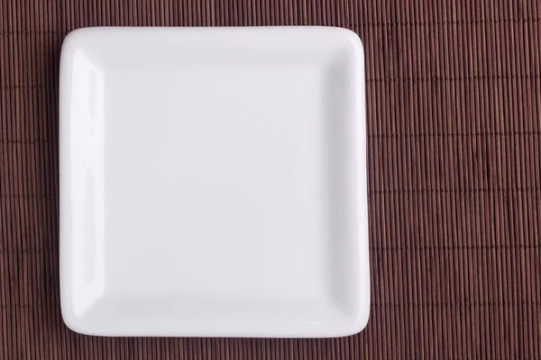 Square ceramic plate — Stock Photo, Image