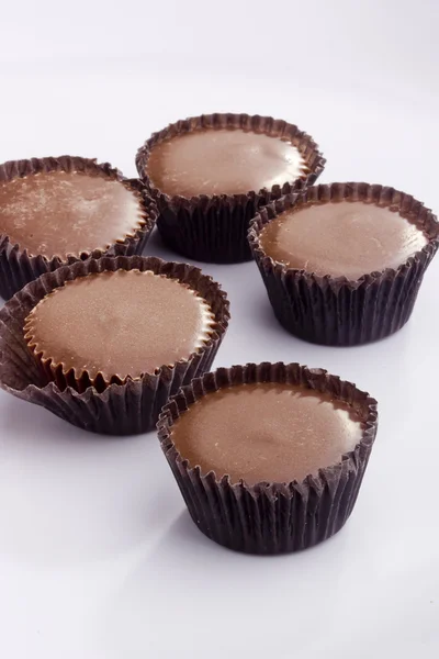 Milk chocolate cups — Stock Photo, Image