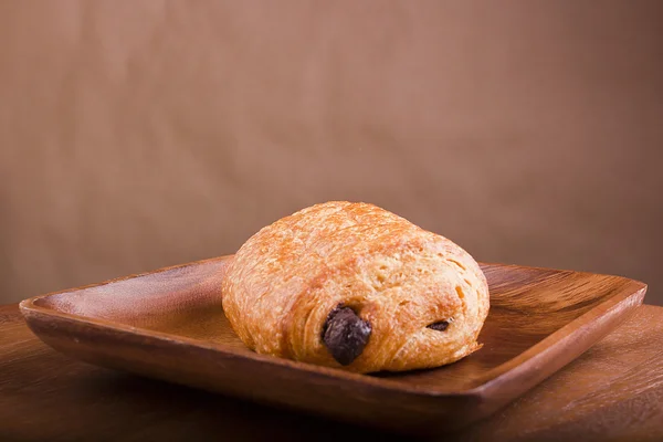 Dark chocolate croissant — Stock Photo, Image