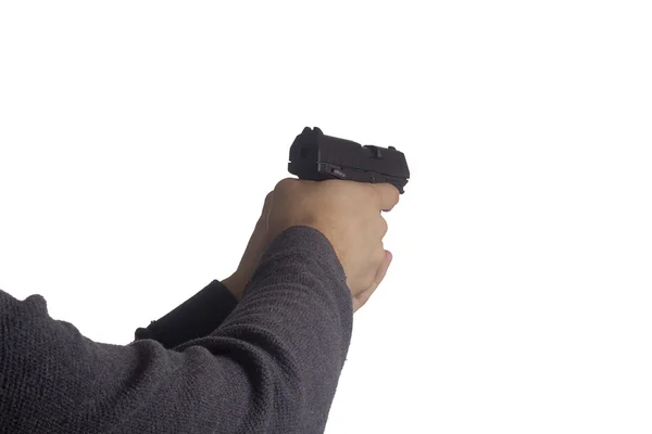 Пистолет в руке — стоковое фото