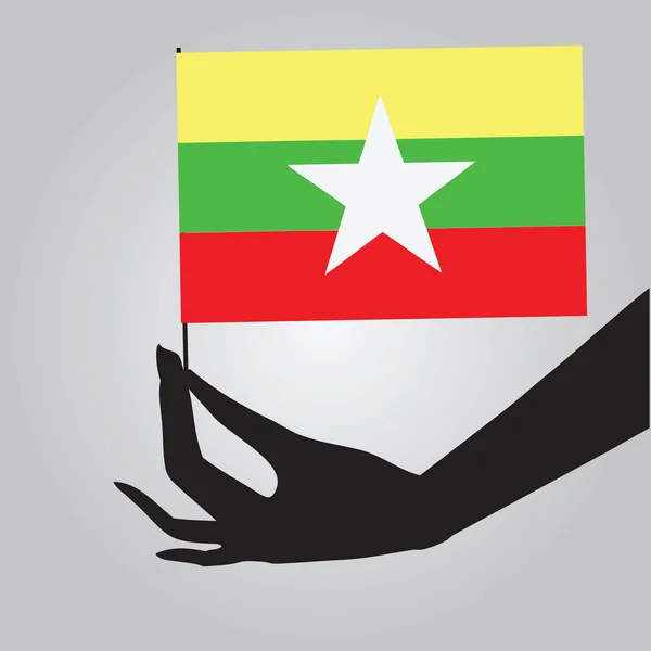Burma flagga i handen — Stock vektor