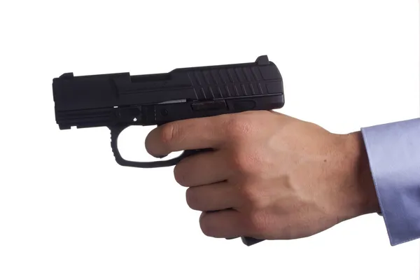 Pistol in hand — Stock Photo, Image