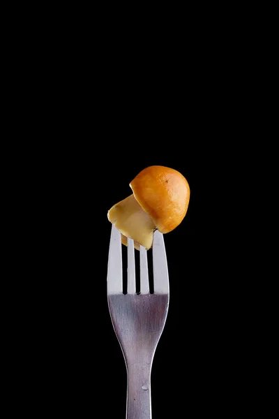 Mushroom on a fork — Stock Photo, Image