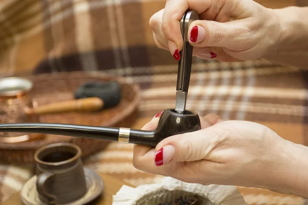 Stamper met een doorsnee tabak pijp — Stockfoto