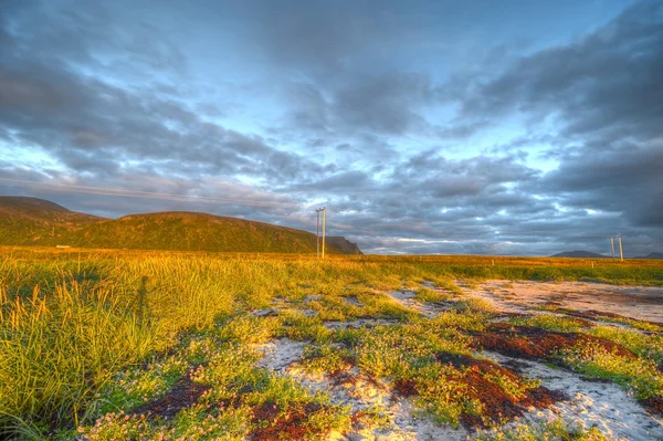 Majestic sunset on the coast of the Norwegian island — Stock Photo, Image