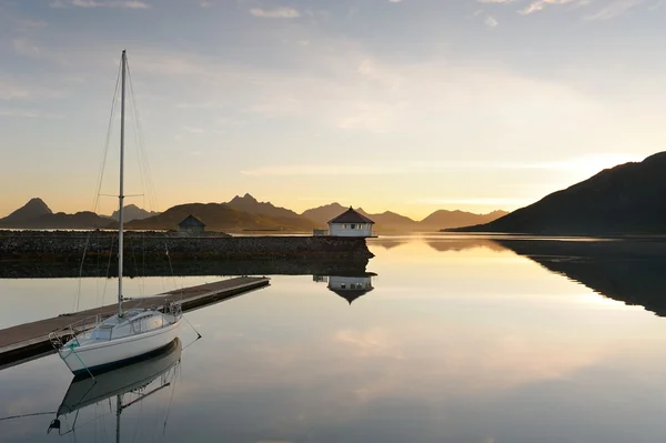 Sunset over the fjord in calm weather — Stock Photo, Image