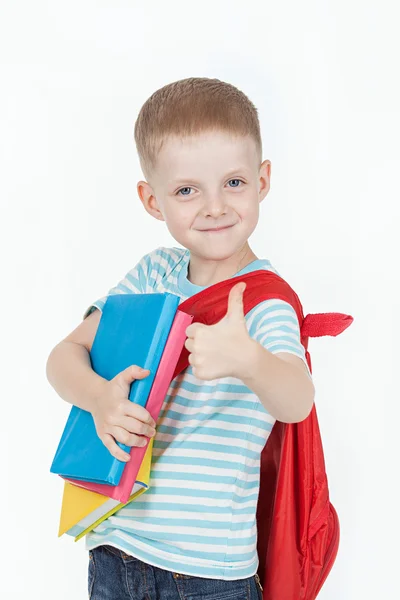 Niño con libros sobre fondo blanco —  Fotos de Stock