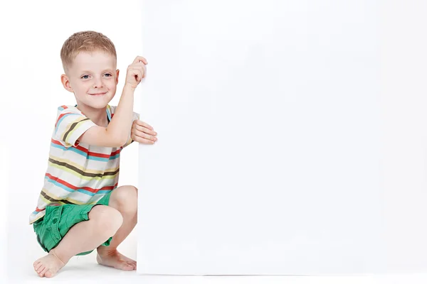 Junge auf weißem Hintergrund — Stockfoto