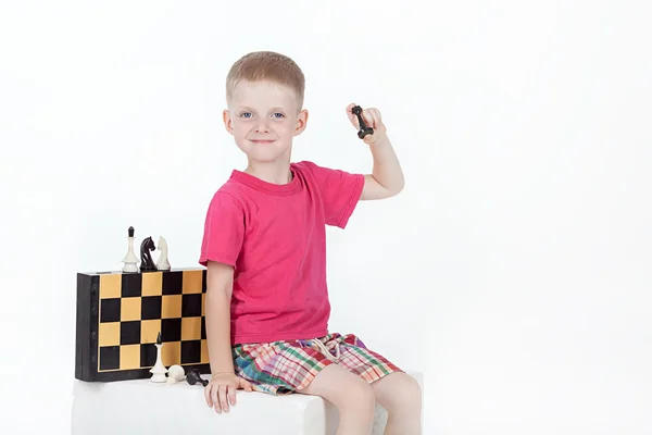 Boy with chessboard — Stock Photo, Image