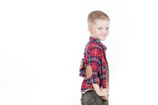 Boy in red shirt in black cell — Stock Photo, Image