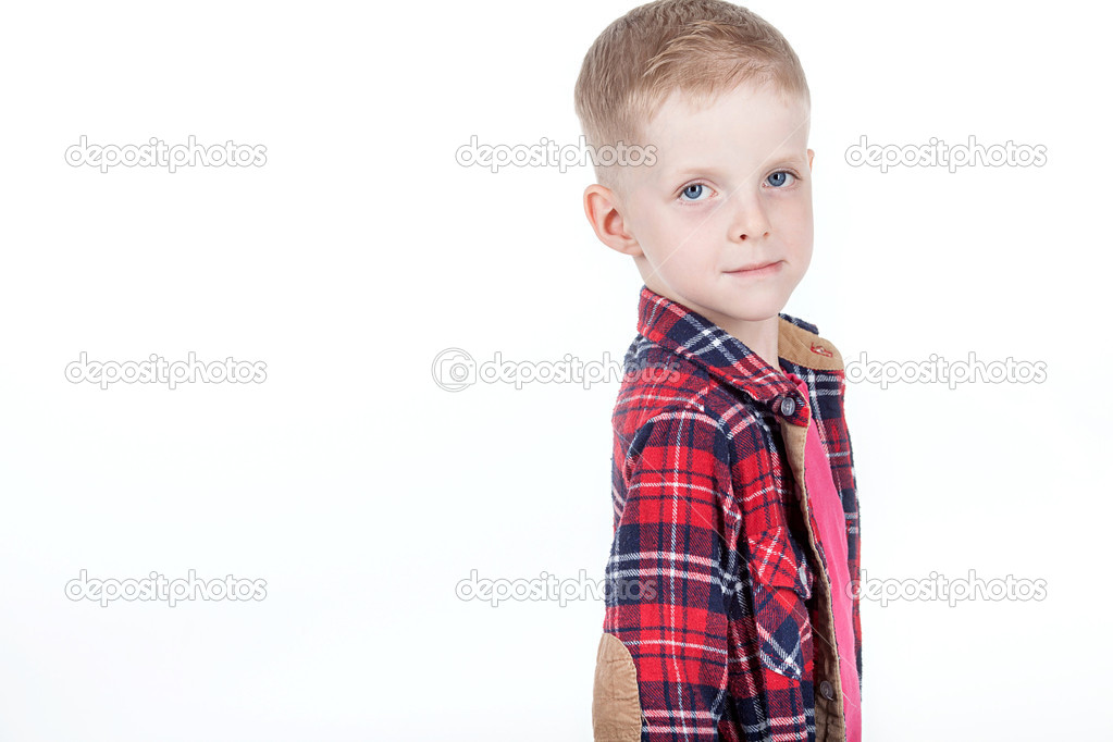 Boy in red shirt in black cell