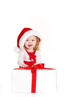 mevcut giyen Noel Baba şapkası üzerinde beyaz izole tutan çocuk