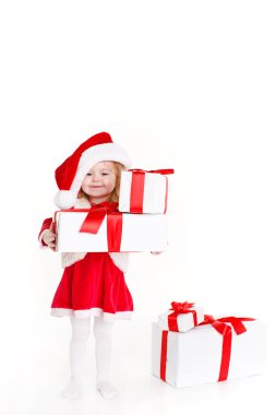 mevcut giyen Noel Baba şapkası üzerinde beyaz izole tutan çocuk
