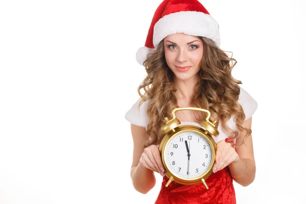 Beautiful girl in a cap of Santa Claus with gifts on a white background — Stock Photo, Image