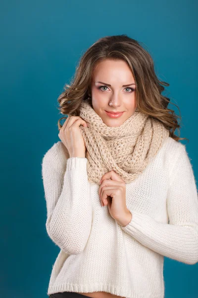 Girl in sweater and scarf — Stock Photo, Image