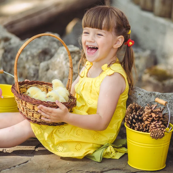 Little girl with chickens — Stock Photo, Image