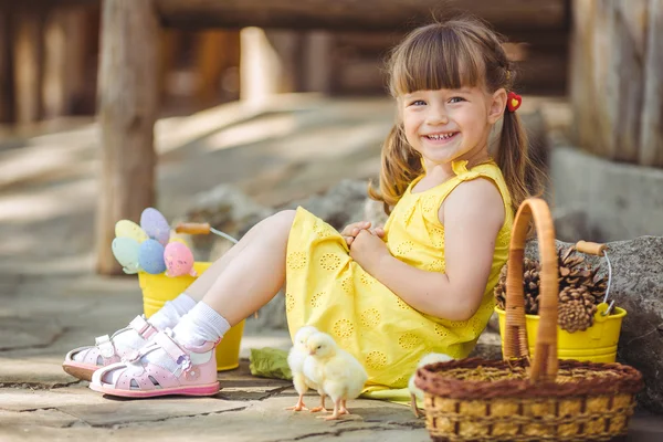 Little girl with chickens — Stock Photo, Image