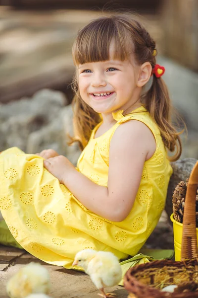 Little girl with chickens — Stock Photo, Image