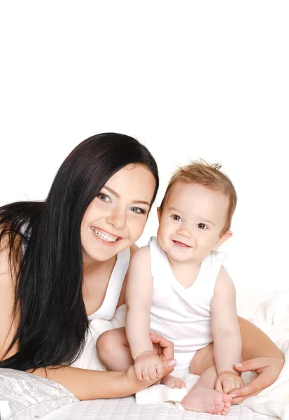 Portrait of mother playing with her baby infant isolated on white background — Stock Photo, Image