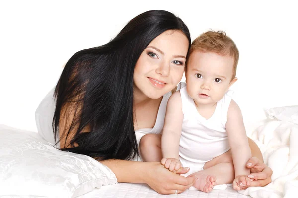 Portrait of mother playing with her baby infant isolated on white background — Stock Photo, Image