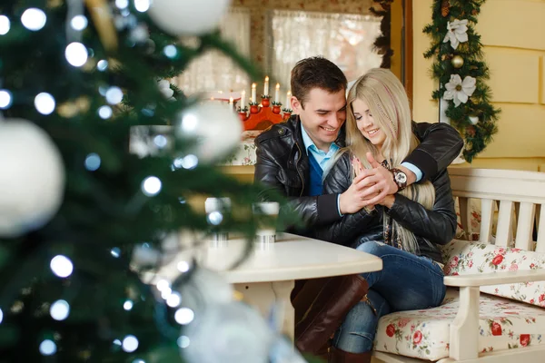 Romantic Young Couple Embracing and having fun indoor — Stock Photo, Image