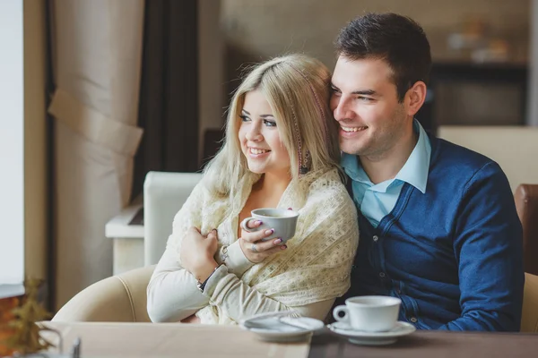 Romantic Young Couple Embracing and having fun indoor — Stock Photo, Image