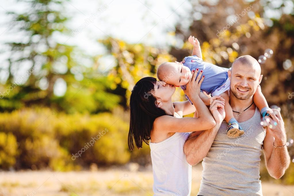 Happy family having fun outdoors