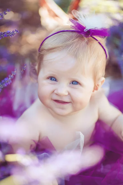 Portrait of an adorable smiling girl in lavender field — Stock Photo, Image