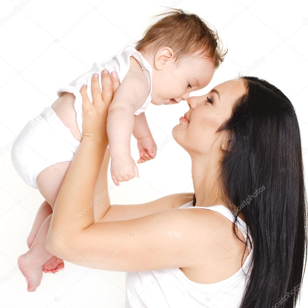 Happy cheerful family. Mother and baby having fun