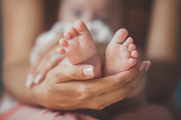 Masseur massaging little baby's foot, shallow focus — Stock Photo, Image