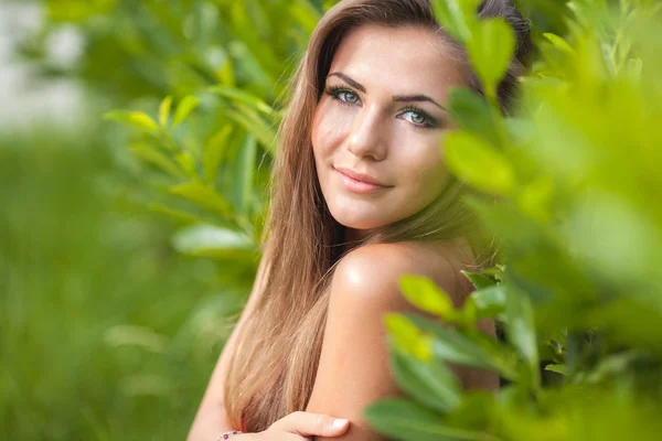 Closeup portrait of beautiful young woman smiling - Outdoor in summer green park Royalty Free Stock Photos