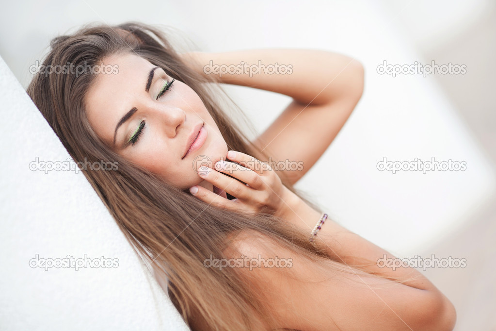 Portrait of the beautiful young woman with beauty