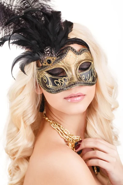 Portrait of Beautiful young blonde woman in black and gold mysterious venetian mask. Fashion photo on white background — Stock Photo, Image