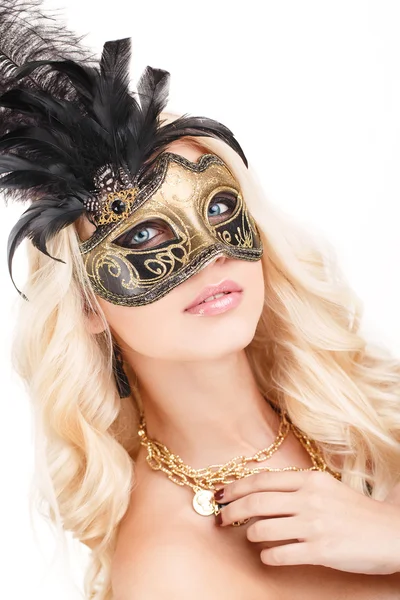Portrait of Beautiful young blonde woman in black and gold mysterious venetian mask. Fashion photo on white background Stock Picture