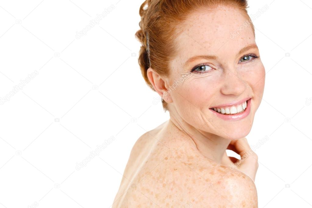 Portrait of Beautiful woman touching her face. Woman with Fresh Clean Skin, Beautiful Face. Pure Natural Beauty. Perfect Skin. Isolated on a White Background.