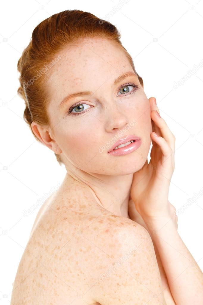 Portrait of Beautiful woman touching her face. Woman with Fresh Clean Skin, Beautiful Face. Pure Natural Beauty. Perfect Skin. Isolated on a White Background.