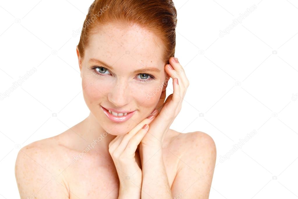 Portrait of Beautiful woman touching her face. Woman with Fresh Clean Skin, Beautiful Face. Pure Natural Beauty. Perfect Skin. Isolated on a White Background.