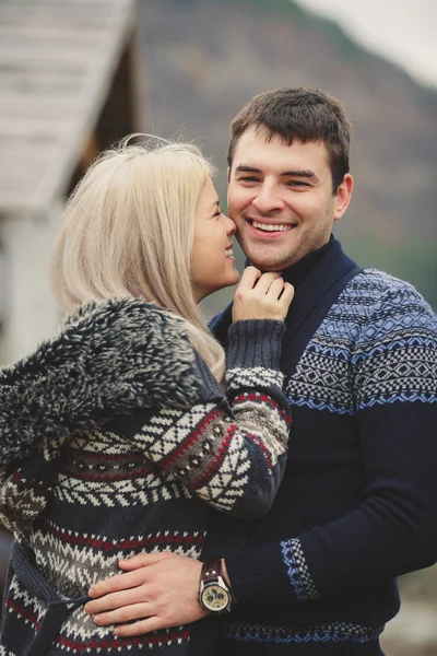 Young couple in love walking in autumn park holding hands — Stock Photo, Image