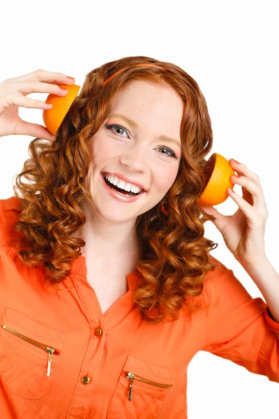 Portrait of attractive caucasian smiling woman isolated on white studio shot with oranges — Stock Photo, Image